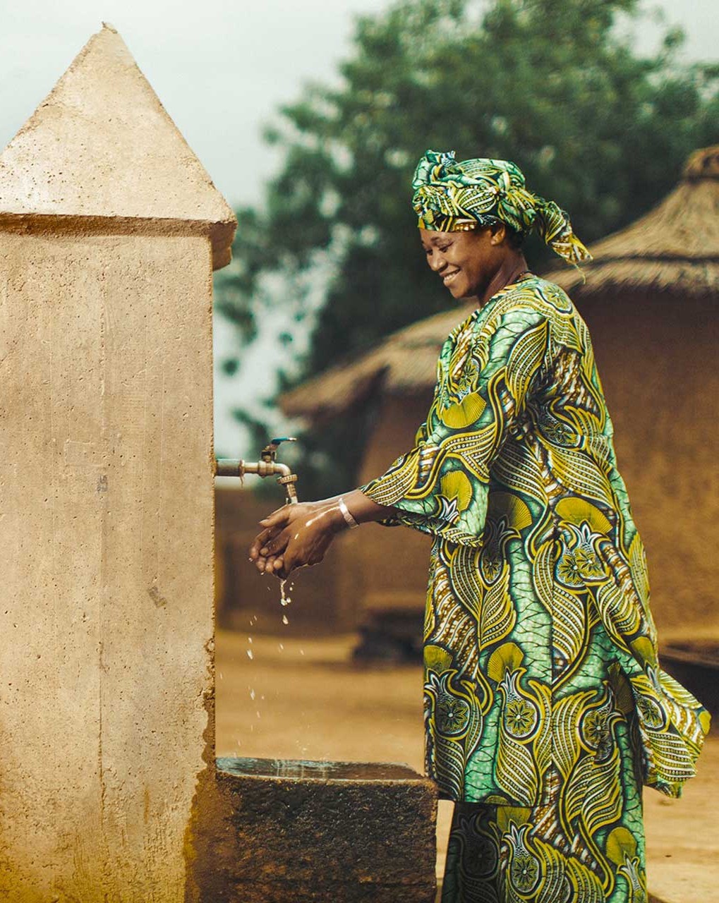 Woman at Water Pump
